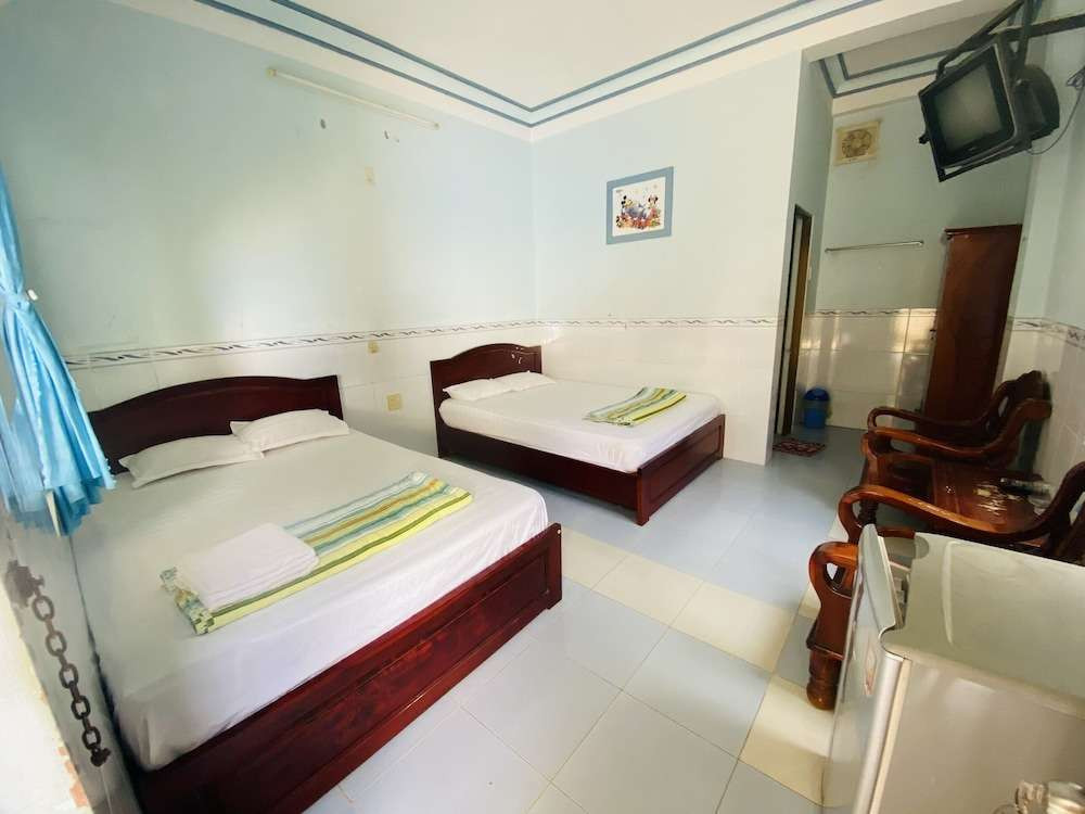 Nhà Nghỉ Hoa Biển ở Mũi Né với cây xanh mát mẻ