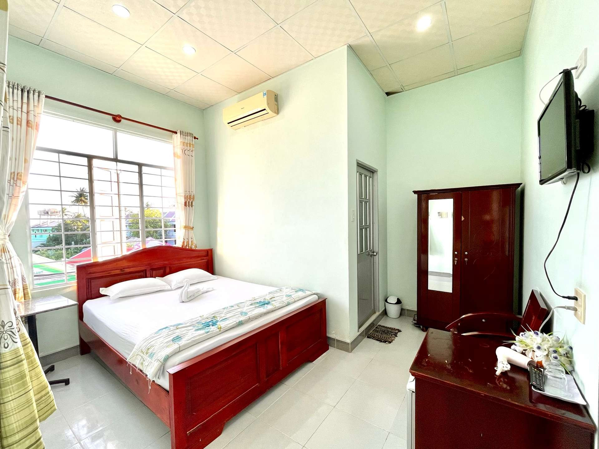 Phòng nghỉ sạch sẽ tại Nhà nghỉ Quốc Định, Mũi Né